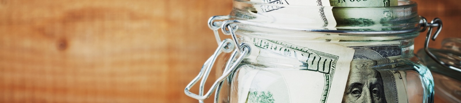 Picture of banknotes in a glass jar
